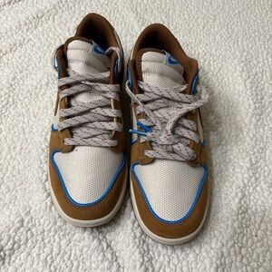 Brown and White Sneakers with Blue Accents